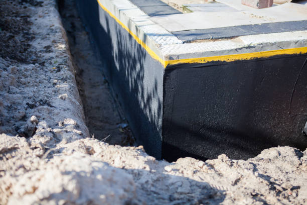 Professional Basement Waterproofing technician working in Rocky Hill, NJ